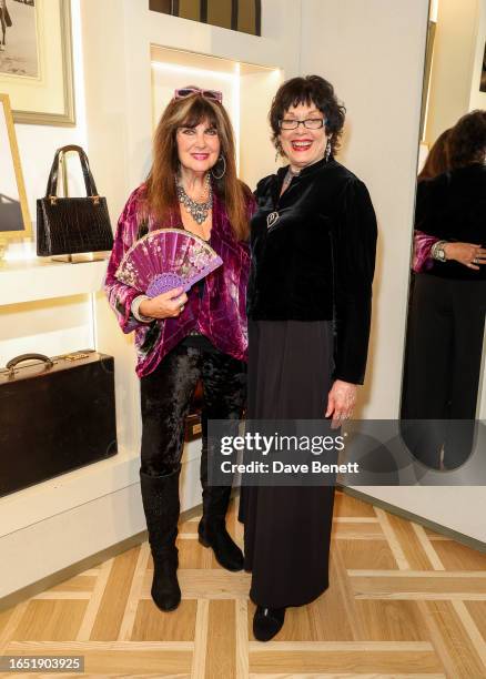 Caroline Munro and Martine Beswick attend a private view of photographer Alistair Guy's new exhibition "Incidentals 2" at House Of Swaine on...