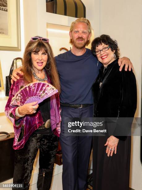 Caroline Munro, Alistair Guy and Martine Beswick attend a private view of photographer Alistair Guy's new exhibition "Incidentals 2" at House Of...