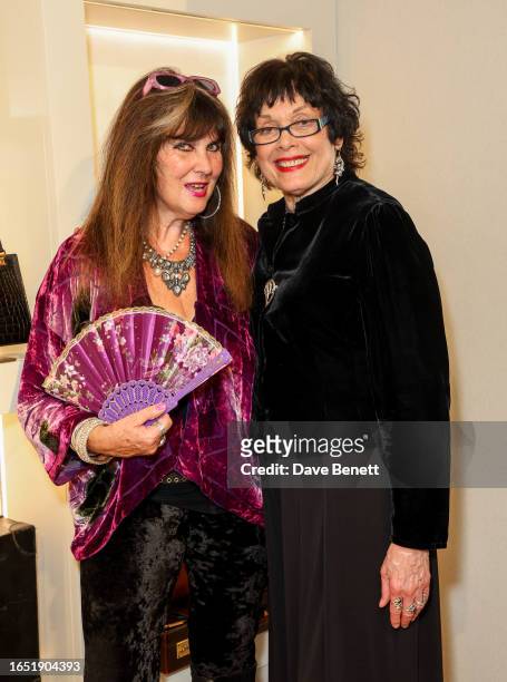 Caroline Munro and Martine Beswick attend a private view of photographer Alistair Guy's new exhibition "Incidentals 2" at House Of Swaine on...