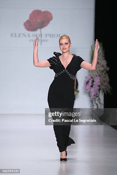 Model walks the runway at the Elena Souproun show during Mercedes-Benz Fashion Week Russia Fall/Winter 2013/2014 at Manege on April 1, 2013 in...