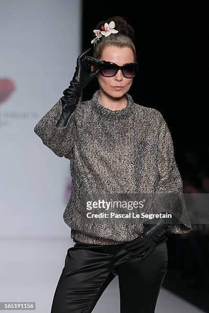 Model walks the runway at the Elena Souproun show during Mercedes-Benz Fashion Week Russia Fall/Winter 2013/2014 at Manege on April 1, 2013 in...