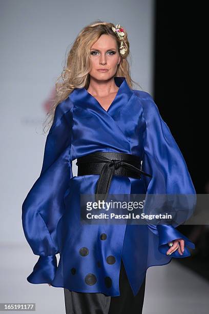 Model walks the runway at the Elena Souproun show during Mercedes-Benz Fashion Week Russia Fall/Winter 2013/2014 at Manege on April 1, 2013 in...