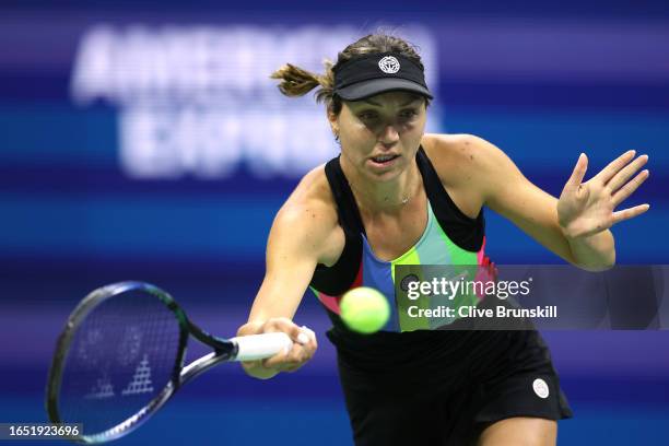 Patricia Maria Tig of Romania returns a shot against Jessica Pegula of the United States during their Women's Singles Second Round match on Day Four...