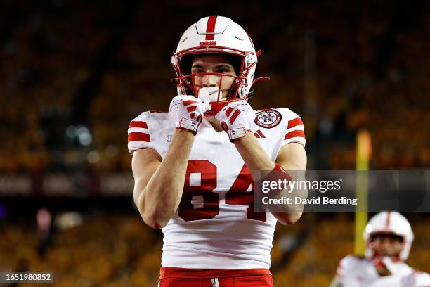 Alex Bullock of the Nebraska Cornhuskers celebrates his touchdown against the Minnesota Golden Gophers in the second half at Huntington Bank Stadium...