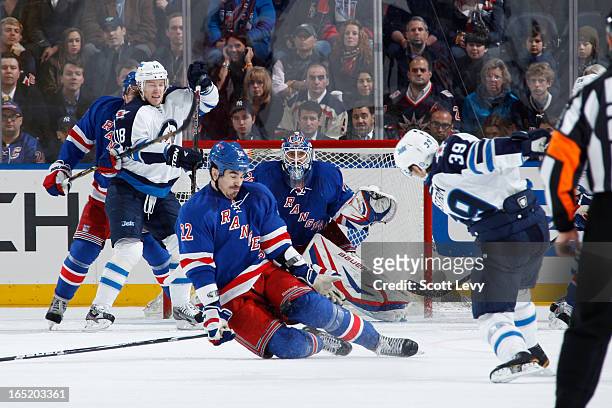 Brian Boyle of the New York Rangers blocks a shot by Tobias Enstrom of the Winnipeg Jets at Madison Square Garden on April 1, 2013 in New York City.