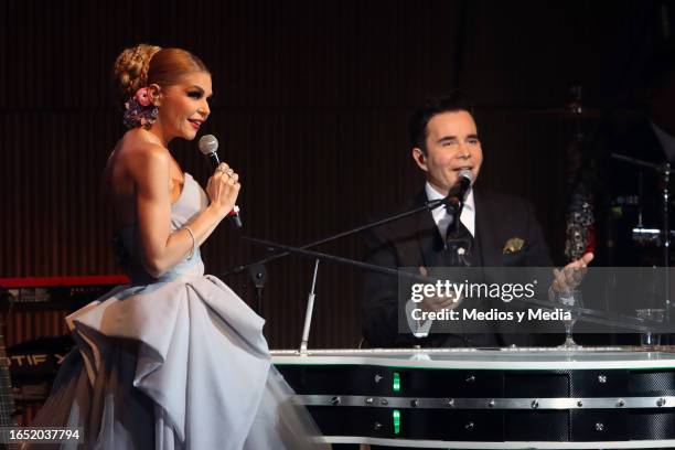 Itatí Cantoral and José Cantoral performs on stage during a concert at El Cantoral on August 31, 2023 in Mexico City, Mexico.