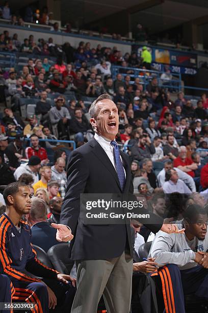 Head Coach Mike Dunlap of the Charlotte Bobcats yells from the sideline against the Milwaukee Bucks on April 1, 2013 at the BMO Harris Bradley Center...