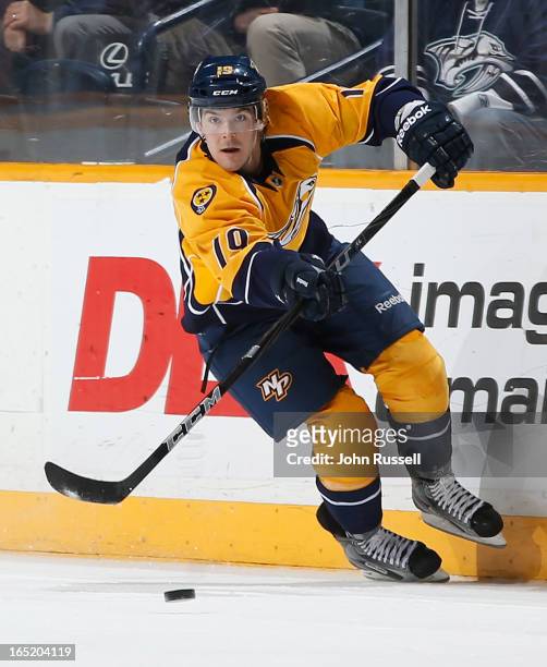 Bobby Butler of the Nashville Predators passes the puck against the Phoenix Coyotes during an NHL game at the Bridgestone Arena on March 28, 2013 in...