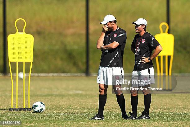 Tony Popovic and Ante Milicic look on during the Western Sydney Wanderers A-League training session at Blacktown International Sportspark on April 2,...