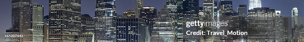 Lower Manhattan skyline at night panoramic
