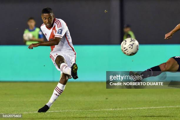 Peru's forward Andy Polo kicks the ball during the 2026 FIFA World Cup South American qualifiers football match between Paraguay and Peru, at the...