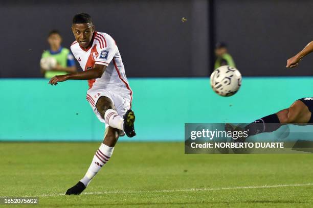 Peru's forward Andy Polo kicks the ball during the 2026 FIFA World Cup South American qualifiers football match between Paraguay and Peru, at the...