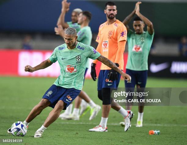 Brazil's Richarlison participates in a training session at the Mangueirao stadium in Belem, Para State, Brazil, on September 7 on the eve of their...