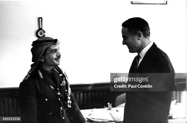 King Hussein of Jordan receives Peace Corps founder and president Sargent Shriver , during the latter's around-the-world trip to visit Peace Corps...