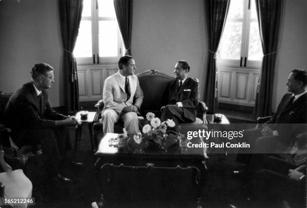 During an around-the-world trip to visit Peace Corps volunteers, Peace Corps founder and president Sargent Shriver talks with Deputy Prime Minister...