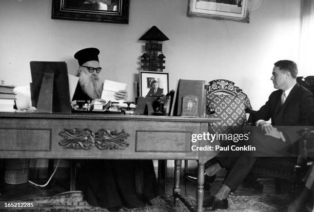 During an around-the-world trip to visit Peace Corps volunteers, Patriarch Athenagoras I of Constantinople reads a letter presented by Peace Corps...