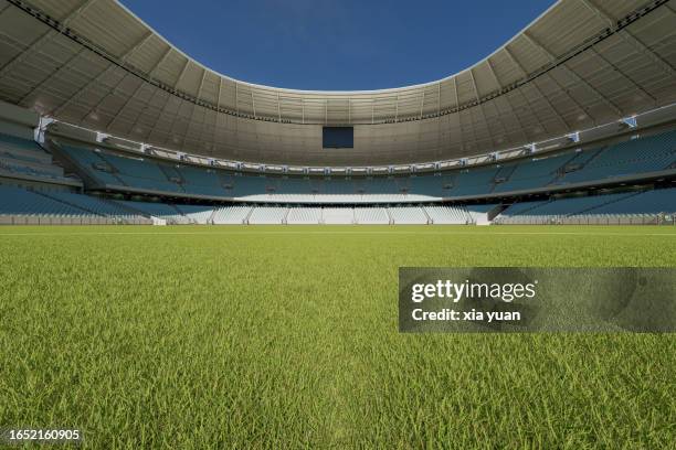 an empty soccer stadium - empty stadium stock-fotos und bilder