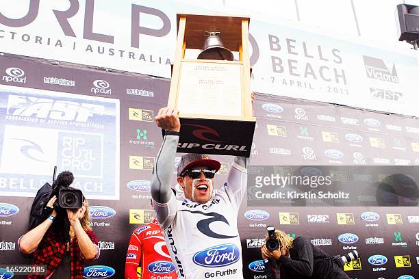 Adriano De Souza of Brasil rings the bell during prizegiving after winning the Rip Curl Pro on April 2, 2013 in Bells Beach, Australia.