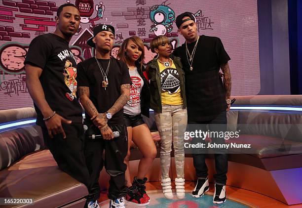 Park" hosts Shorty Da Prince, Bow Wow, Paigion, and Ms. Mykie pose for a picture with recording artist Chris Brown during a taping of BET's "106 &...