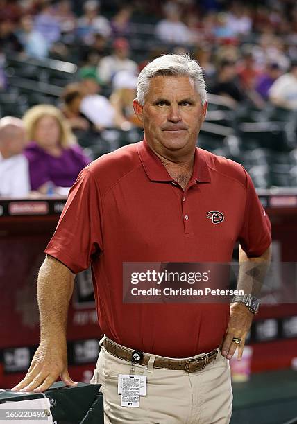 General manager Kevin Towers of the Arizona Diamondbacks stands on the field before the MLB Opening Day game against the St. Louis Cardinals at Chase...