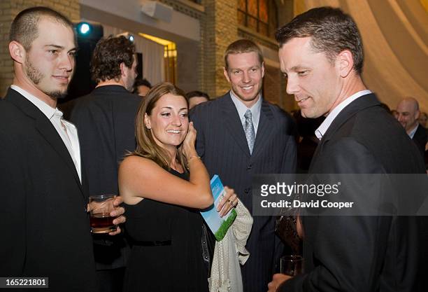 June 11 2008- Dustin McGowan, Roy and Brandy Halladay and former Jay Pat Hentgen, attending the Jays Care Foundation Field of Dreams event in the...