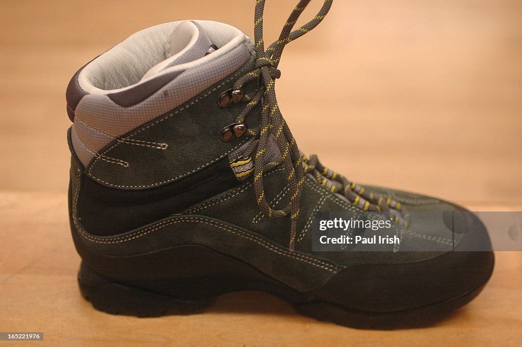 Mountain Equipment Co-op shoe specialist, Placido Cerce (cct), holds the Salomon Solaris Low Cut sel