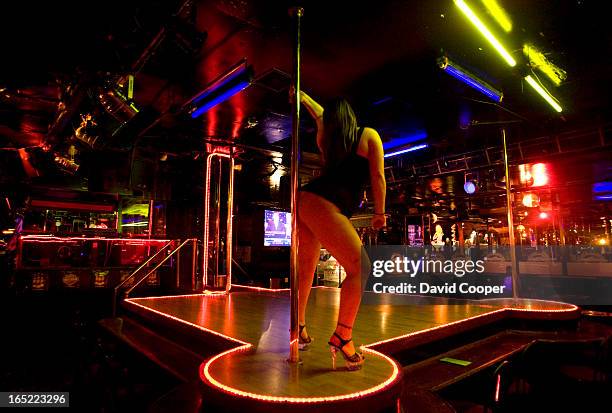 April 15 2008- An exotic dancer on stage at Caddy's Strip Club, 2787 Eglinton Ave. E. The number of licensed exotic dancers in the city of Toronto...