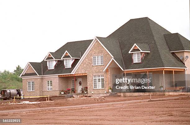 Homes completed or under construction in the tony Glen Williams Estates, a collection of 30 homes being built by Chaleston Homes. They are in a dale...