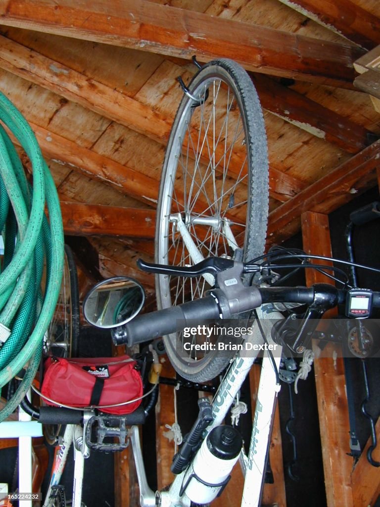 Arnold Roper, 61, with his huge garage, cars, stock car racing trophies,boys room and chiropractic o