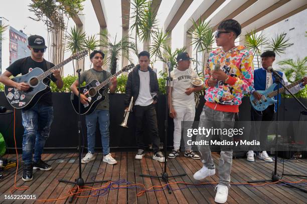 David Farias , Emanuel Silva and Fernando Acosta of Alto Linaje band perform during a showcase at Warner Music Mexico on August 31, 2023 in Mexico...