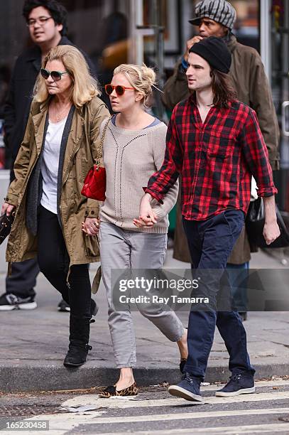 Jo Miller, Sienna Miller, and Tom Sturridge walk in the West Village on April 1, 2013 in New York City.