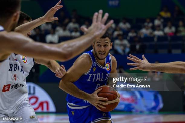 Marco Spissu of Italy competes during the FIBA Basketball World Cup 2nd Round Group I game between Serbia and Italy at Araneta Coliseum on September...