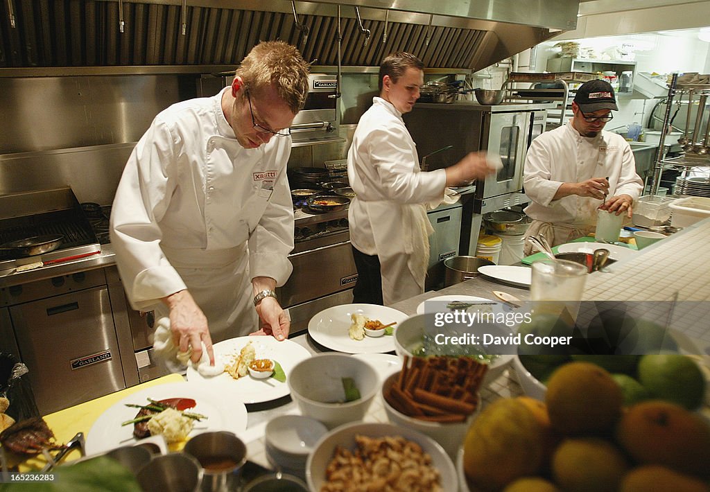 Xacutti Pronounced sha-KOO-tee. Chef and part owner Brad -left. For restaurant review. Pretty room s