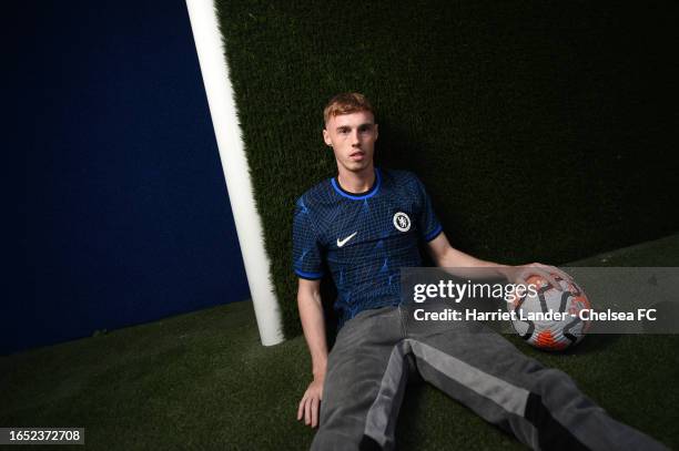 Cole Palmer poses for a photograph as he is signs for Chelsea FC at Chelsea Training Ground on September 01, 2023 in Cobham, England.