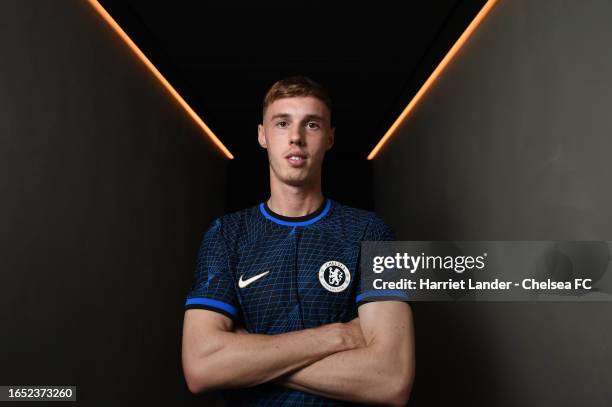 Cole Palmer poses for a photograph as he is signs for Chelsea FC at Chelsea Training Ground on September 01, 2023 in Cobham, England.