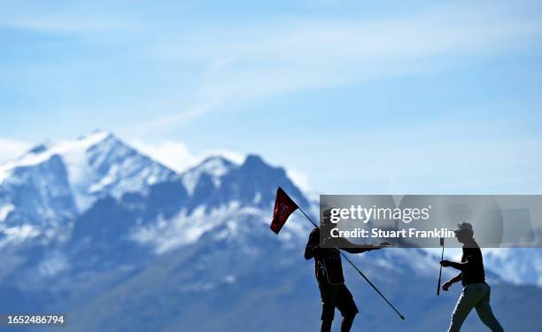 Adrian Otaegui of Spain looks on alongside their caddie on the 7th hole during Day Two of the Omega European Masters at Crans-sur-Sierre Golf Club on...