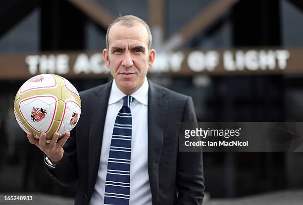 Paolo Di Canio poses with a ball after being unveiled as the new Sunderland manager at The Academy of Light training ground on April 02, 2013 in...