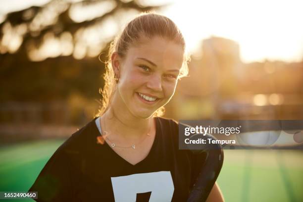 head-shot of teen female hockey player - youth sports competition stock pictures, royalty-free photos & images