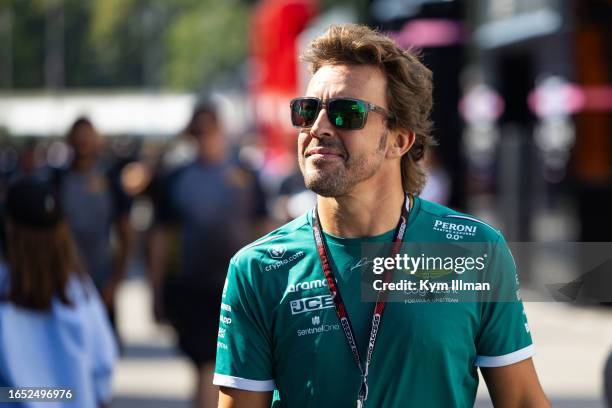 Fernando Alonso of Spain and Aston Martin Aramco Cognizant F1 Team in the paddock during practice ahead of the F1 Grand Prix of Italy at Autodromo...