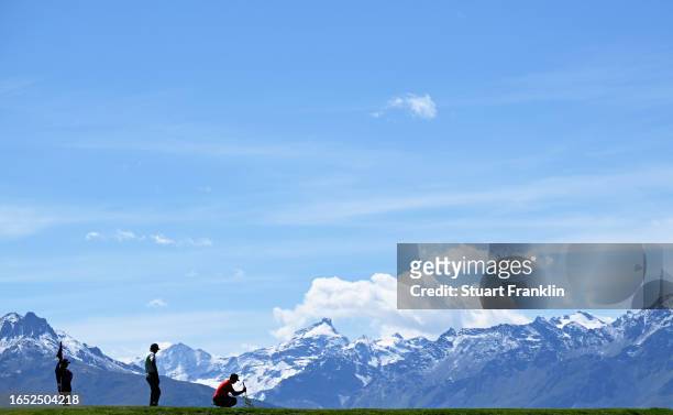 Matt Wallace and Matthew Fitzpatrick line up a putt on the 7th holeduring Day Two of the Omega European Masters at Crans-sur-Sierre Golf Club on...