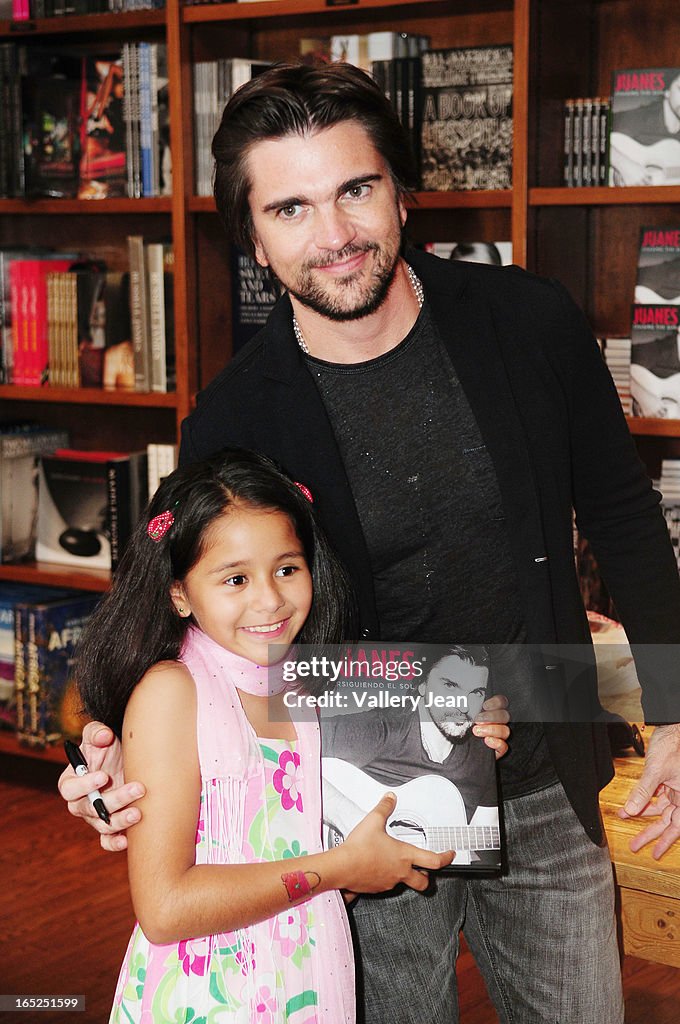 Juanes Signs Copies Of "Chasing The Sun" At Books and Books