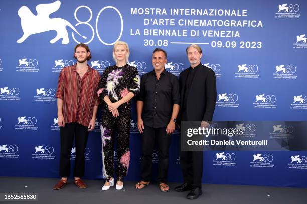 Simon Bennebjerg, Amanda Collin, Director Nikolaj Arcel, and Mads Mikkelsen attend a photocall for the movie "Bastarden " at the 80th Venice...