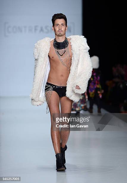 Model walks the runway at the Gera Skandal show for Contrfashion during Mercedes-Benz Fashion Week Russia Fall/Winter 2013/2014 at Manege on April 2,...