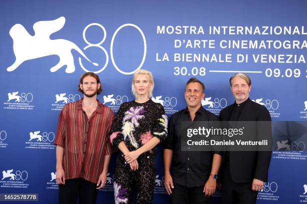 Simon Bennebjerg, Amanda Collin, Director Nikolaj Arcel, and Mads Mikkelsen attend a photocall for the movie "Bastarden " at the 80th Venice...