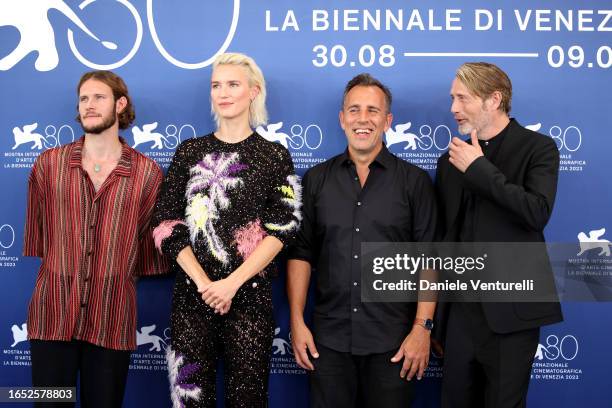 Simon Bennebjerg, Amanda Collin, Director Nikolaj Arcel, and Mads Mikkelsen attend a photocall for the movie "Bastarden " at the 80th Venice...