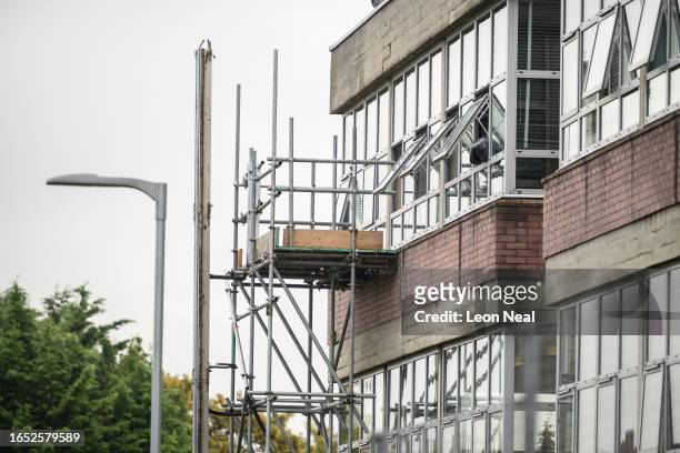 Scaffolding is seen outside classrooms as repair work continues at Hornsey School for Girls on September 01, 2023 in London, England. The school has...
