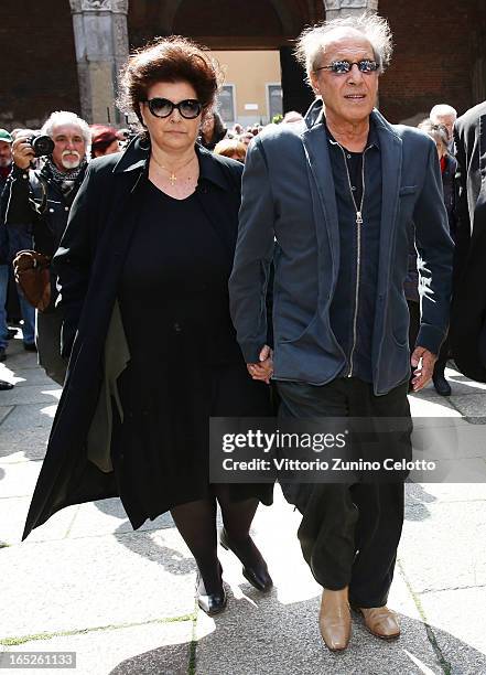 Claudia Mori and Adriano Celentano attend the funeral of Singer Enzo Jannacci at Basilica di Sant'Ambrogio on April 2, 2013 in Milan, Italy.