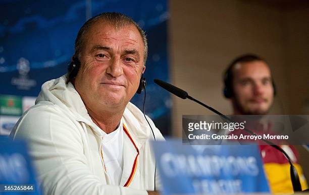 Head coach Fatih Terim listens to questions from the media during a press conference ahead of the UEFA Champions League Quarterfinal match between...