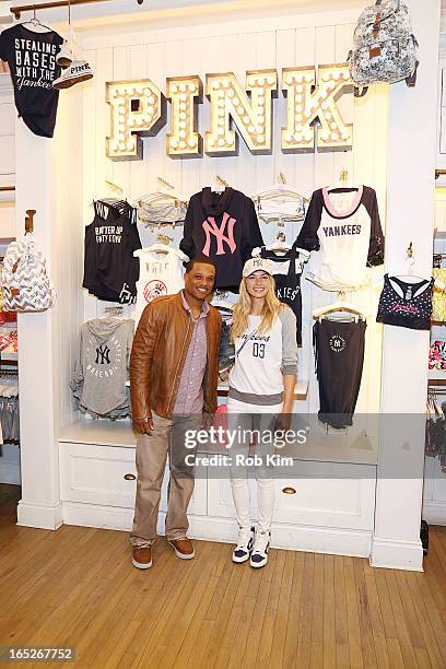 Robinson Cano and Jessica Hart celebrate opening day and the new MLB Pink Collection at Victoria's Secret PINK, Soho on April 2, 2013 in New York...