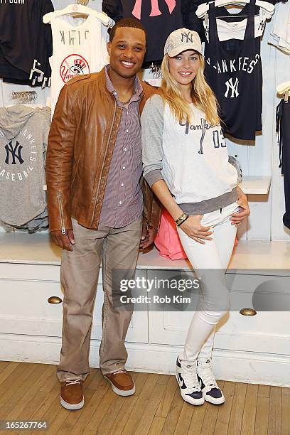 Robinson Cano and Jessica Hart celebrate opening day and the new MLB Pink Collection at Victoria's Secret PINK, Soho on April 2, 2013 in New York...